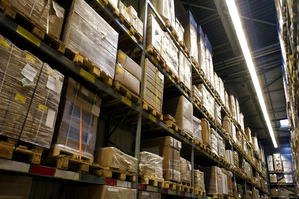 A picture of packages of instruments stored in a wharehouse